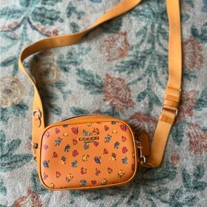 Orange floral COACH purse hardly used